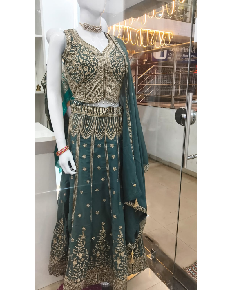 Emerald Green Silk Lehenga with Intricate Gold Zari Work